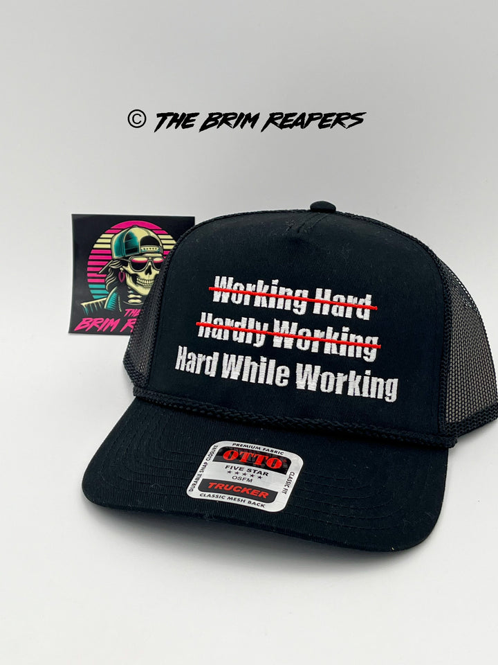 Hard While Working Trucker Hat | Funny Comedy Mens Accessories Cap