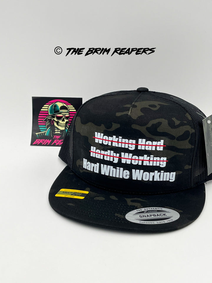 Hard While Working Trucker Hat | Funny Comedy Mens Accessories Cap