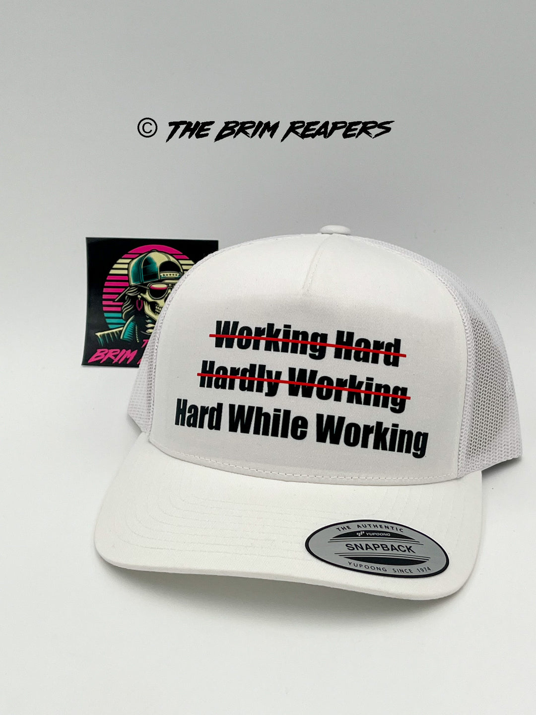 Hard While Working Trucker Hat | Funny Comedy Mens Accessories Cap