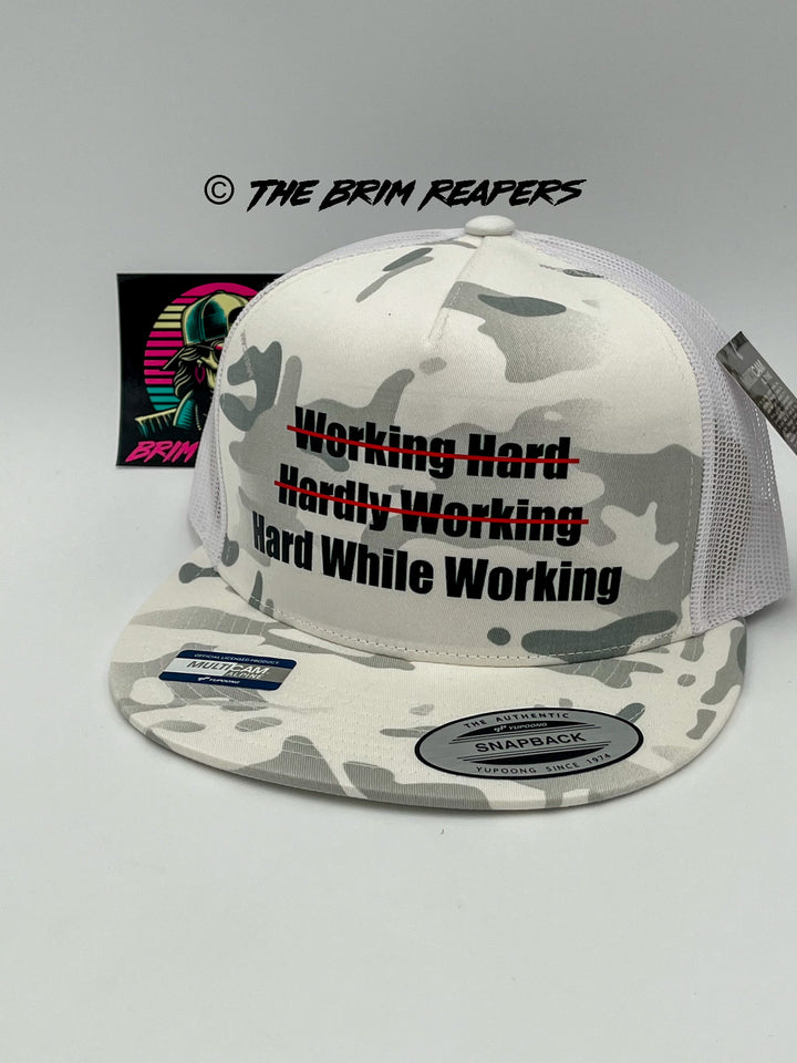 Hard While Working Trucker Hat | Funny Comedy Mens Accessories Cap